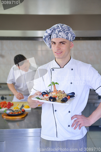 Image of chef preparing food