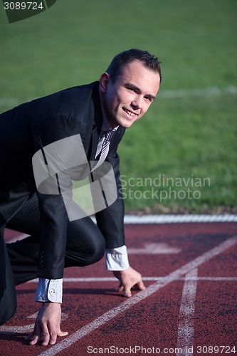 Image of business man ready to sprint