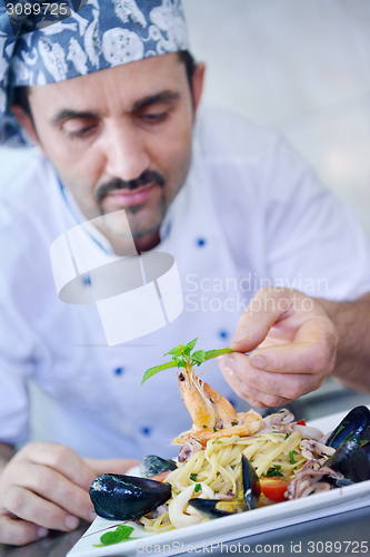 Image of chef preparing food