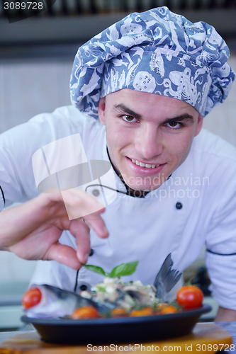 Image of chef preparing food