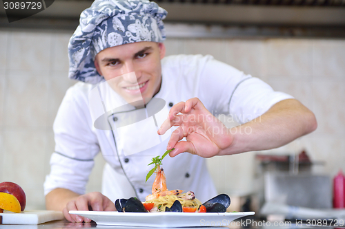 Image of chef preparing food