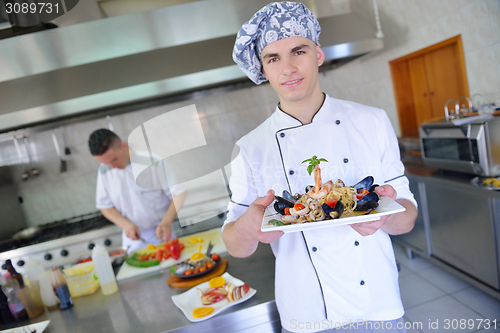 Image of chef preparing food