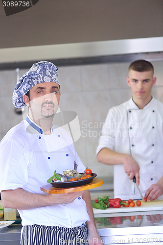 Image of chef preparing food