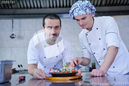 Image of chef preparing food