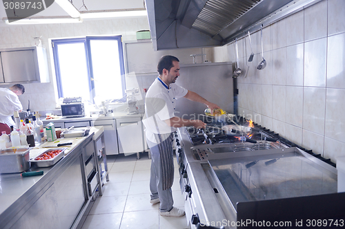 Image of chef preparing food