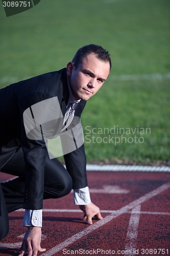 Image of business man ready to sprint