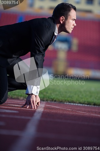 Image of business man ready to sprint