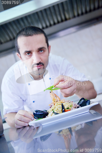 Image of chef preparing food