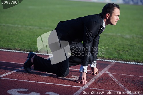 Image of business man ready to sprint