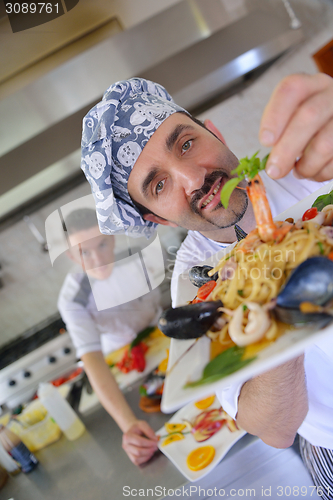 Image of chef preparing food