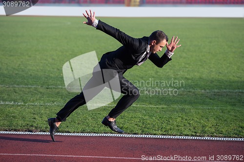 Image of business man ready to sprint