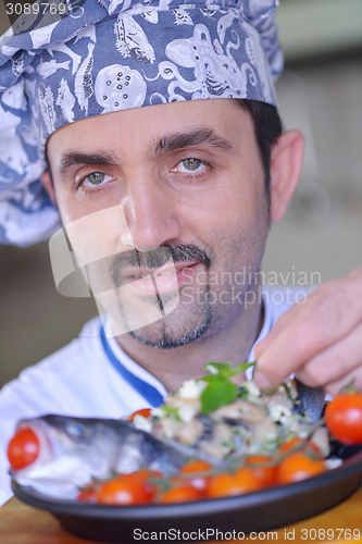 Image of chef preparing food