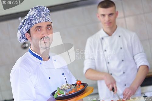 Image of chef preparing food