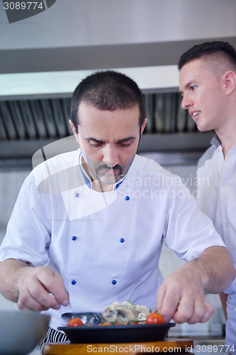 Image of chef preparing food