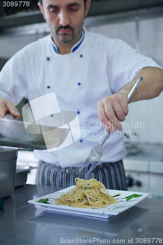 Image of chef preparing food