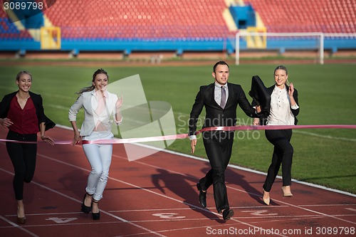 Image of business people running on racing track