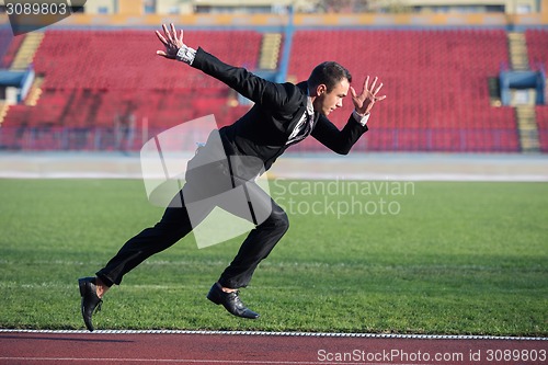 Image of business man ready to sprint