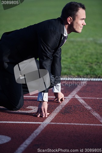 Image of business man ready to sprint