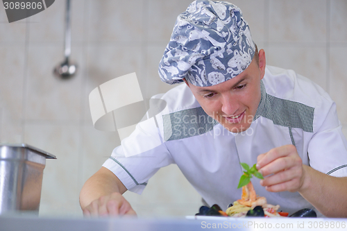 Image of chef preparing food