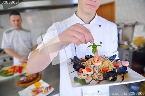 Image of chef preparing food