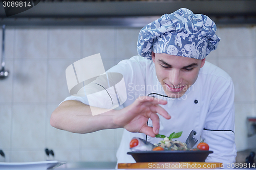 Image of chef preparing food