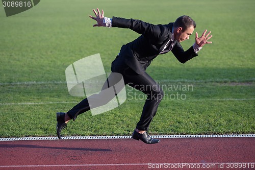 Image of business man ready to sprint