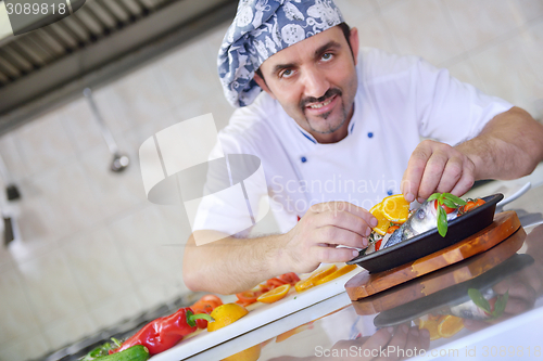 Image of chef preparing food