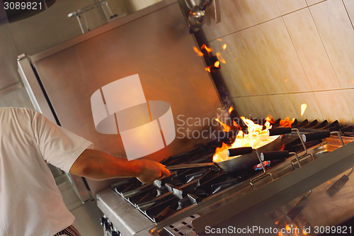 Image of chef preparing food