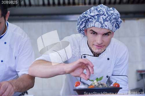 Image of chef preparing food