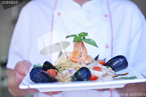 Image of chef preparing food