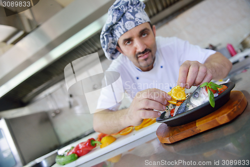 Image of chef preparing food