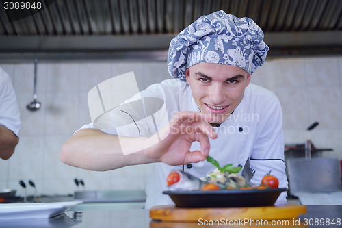 Image of chef preparing food