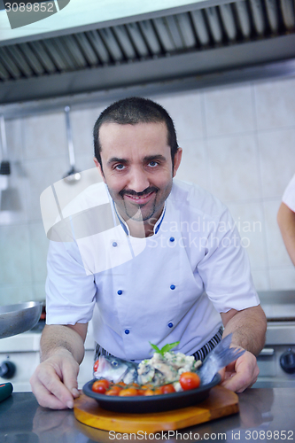 Image of chef preparing food