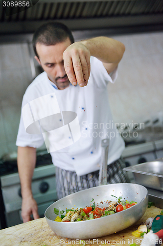 Image of chef preparing food