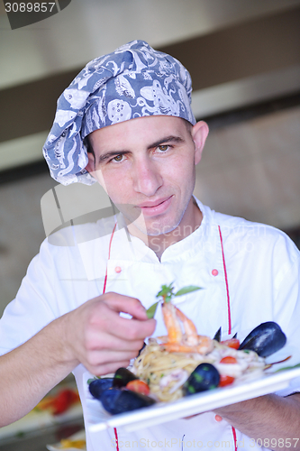 Image of chef preparing food