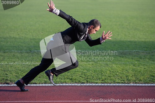 Image of business man ready to sprint