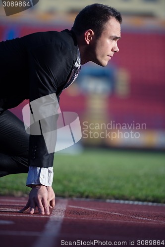 Image of business man ready to sprint