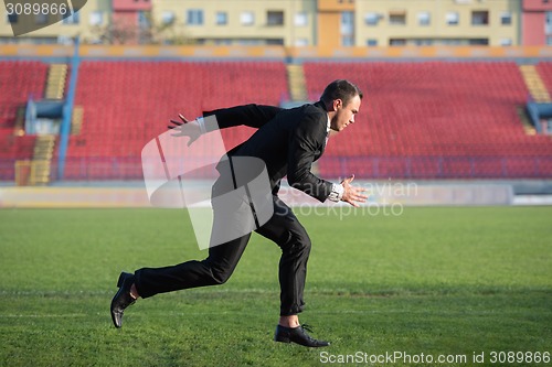 Image of business man ready to sprint