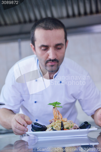 Image of chef preparing food