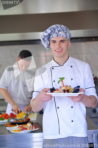 Image of chef preparing food