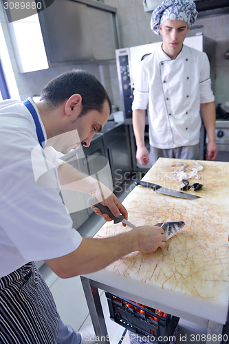 Image of chef preparing food