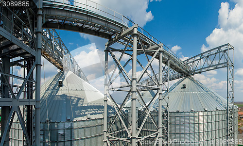 Image of Towers of grain drying enterprise at sunny day