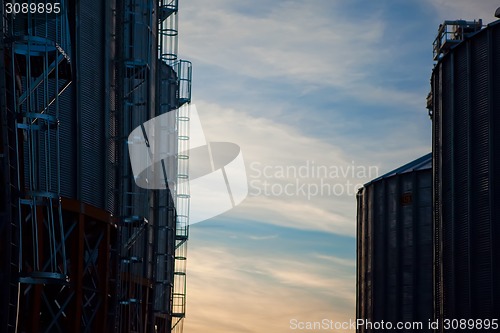 Image of Towers of grain drying enterprise at sunny day