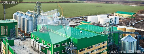 Image of Towers of grain drying enterprise at sunny day