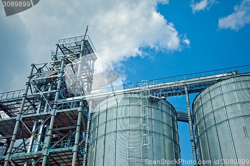 Image of Towers of grain drying enterprise at sunny day