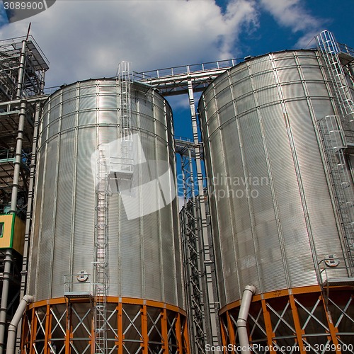 Image of Towers of grain drying enterprise at sunny day