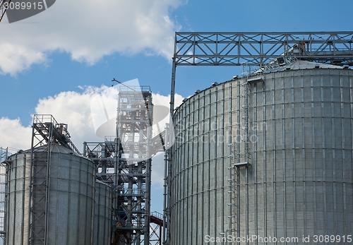 Image of Towers of grain drying enterprise at sunny day