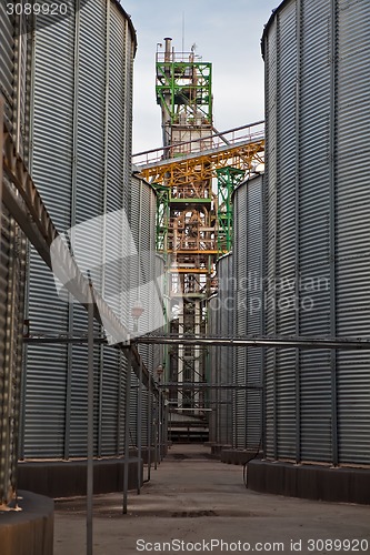 Image of Towers of grain drying enterprise at sunny day