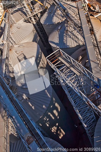 Image of Towers of grain drying enterprise at sunny day