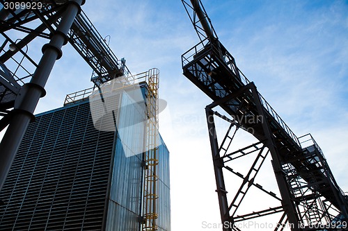 Image of Towers of grain drying enterprise at sunny day